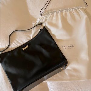 Kate Spade black satin handbag. Gold handle rings and feet. Used once, like new!
